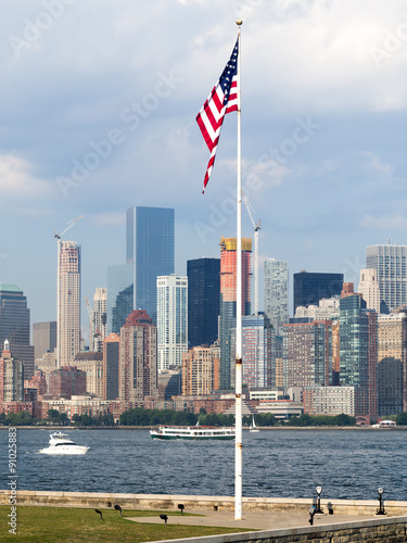 New York skyline with an american flag