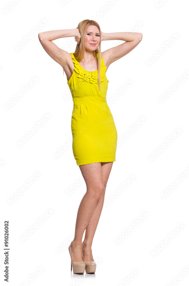 Pretty tall woman in short yellow dress isolated on white Stock
