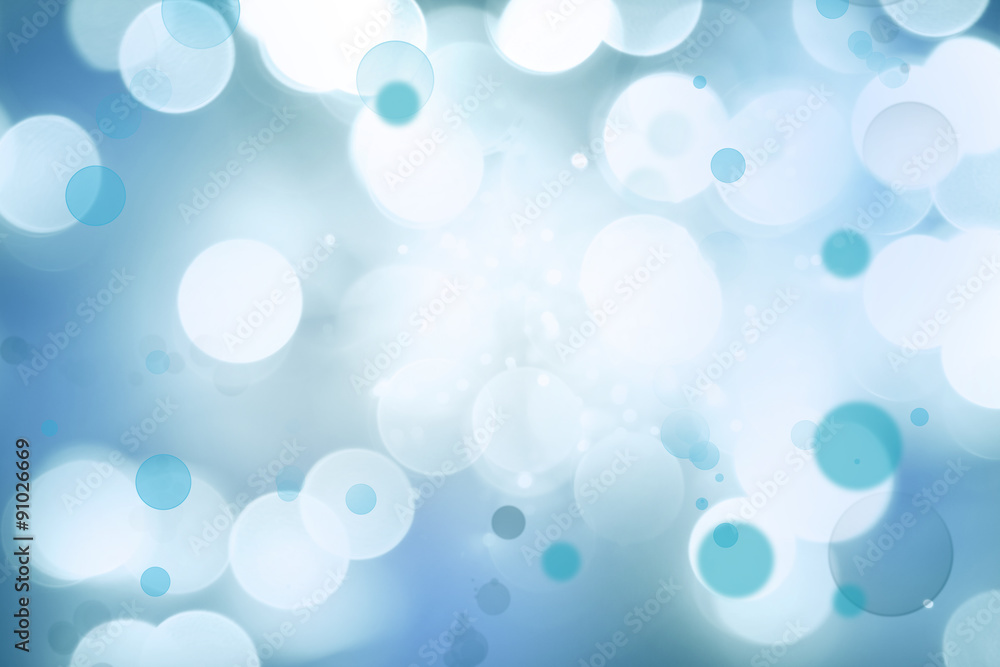 Abstract blue white bokeh light blurs background