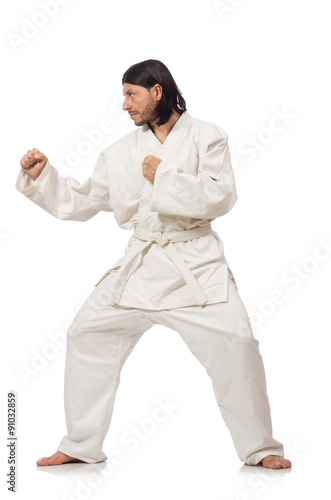 Karate fighter isolated on white © Elnur