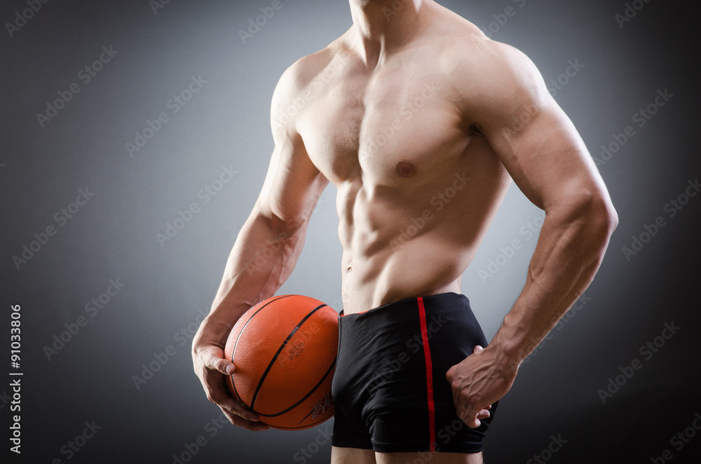 Muscular basketball in sports concept