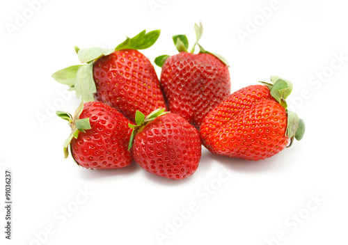 Red juicy wet strawberries closeup