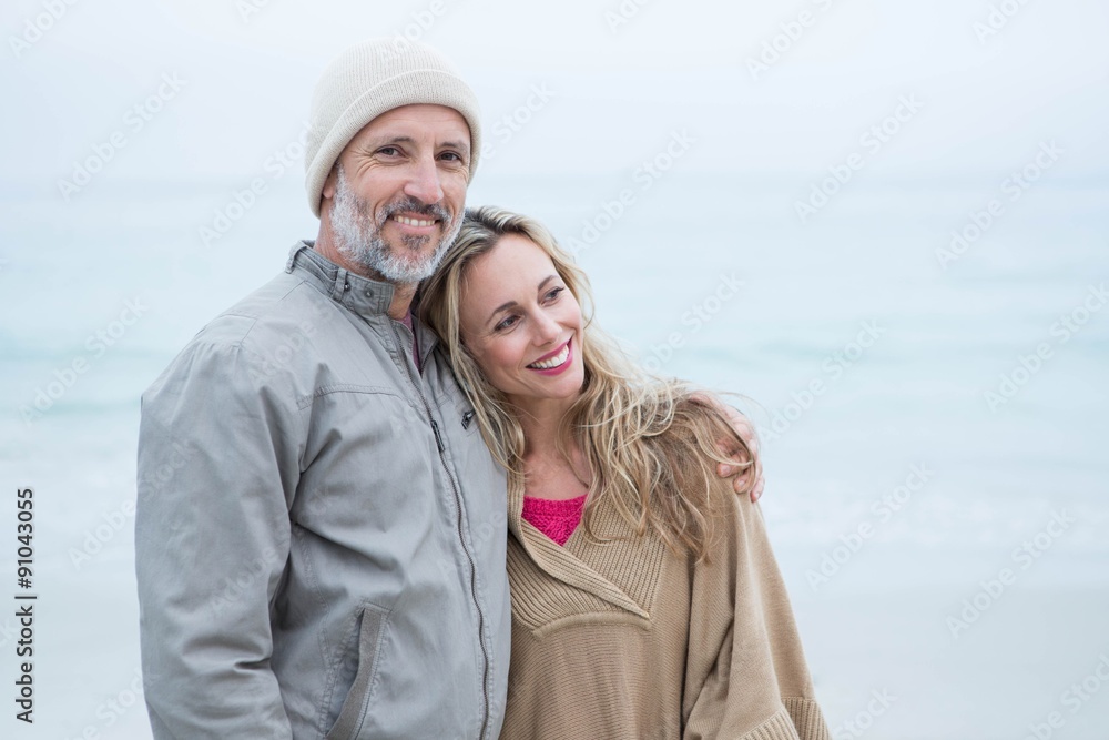 Cute couple standing and holding each other Cute couple standing and holding each other