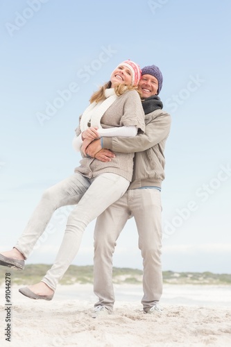 Happy couple holding each other