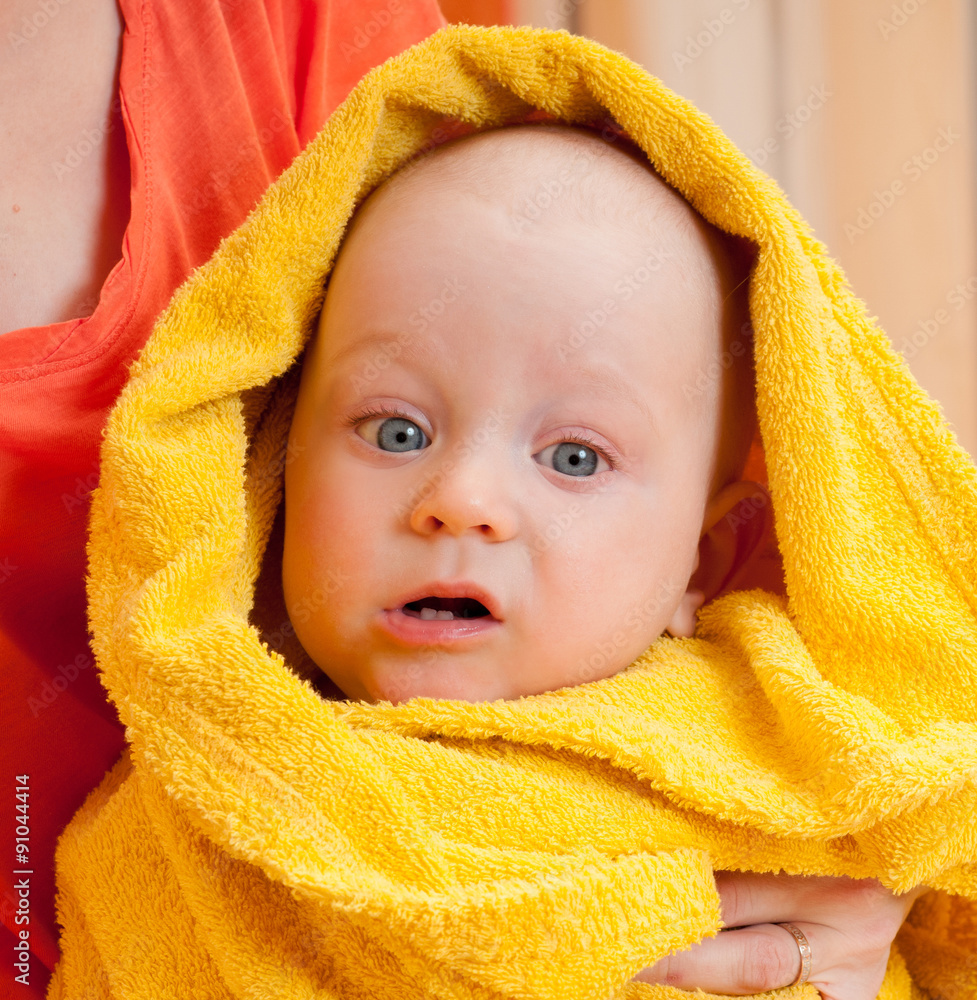 Mother with adorable pretty baby, kid covered with bath towel. A Mother with adorable pretty baby, kid covered with bath towel. A