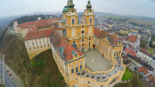 Amazing flyover view of Melk Abbey, Austria. Beautiful building in Baroque style photo