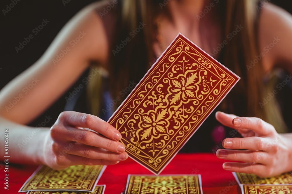 Fortune teller using tarot cards - obrazy, fototapety, plakaty 
