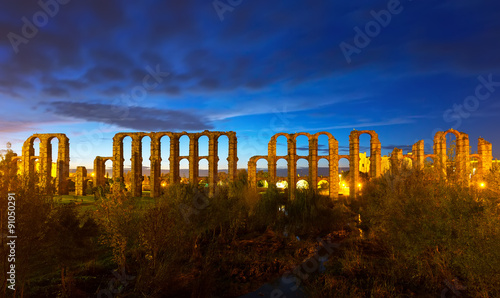 ancient roman aqueduct in night