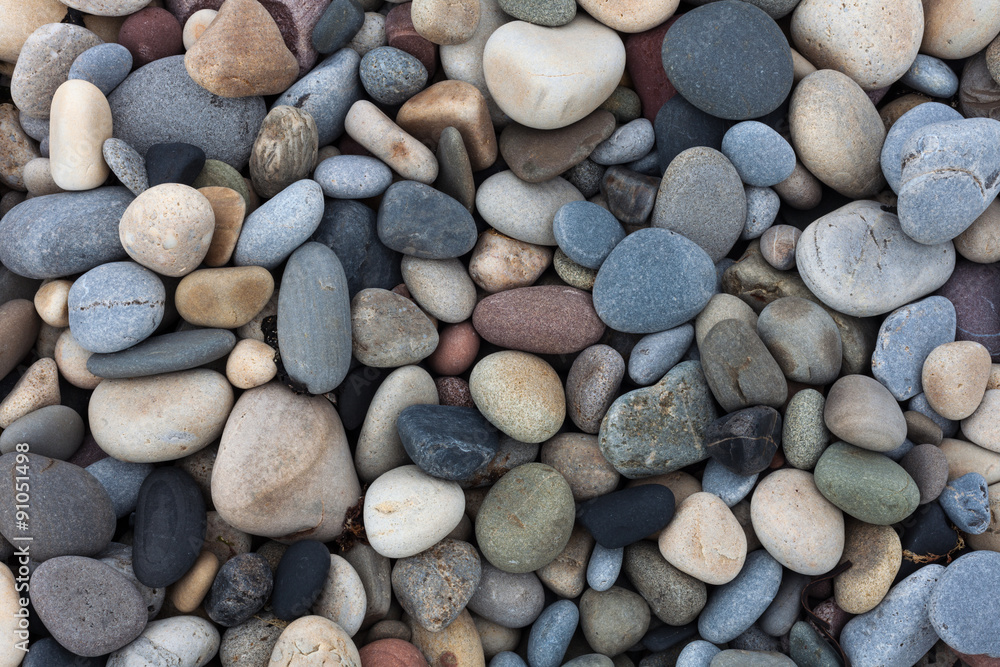 Pebbles on Bracelet Bay on the Gower peninsular, Swansea, UK. Pebbles on Bracelet Bay on the Gower peninsular, Swansea, UK.