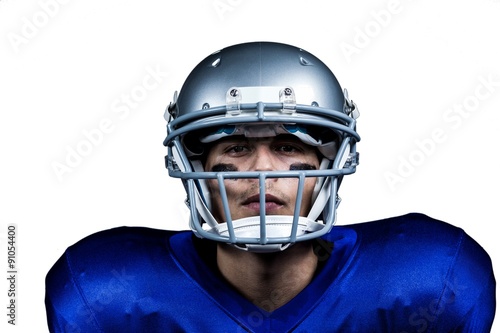 Portrait of determined American football player in uniform