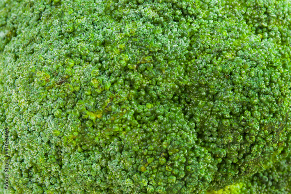 Texture of the top of fresh green broccoli for background.