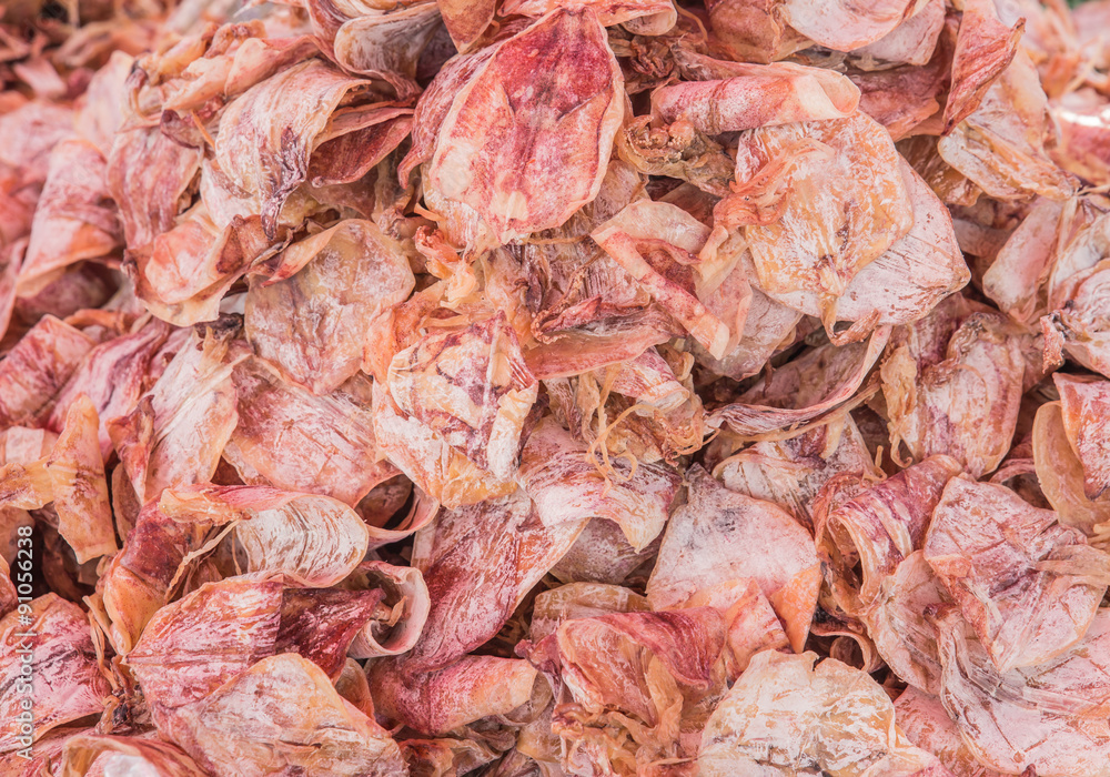 Dried Squid, traditional squids drying in the sun in a market Th Dried Squid, traditional squids drying in the sun in a market Th