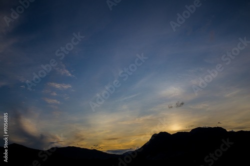 Colorful sunset over the mountain hills © photoraidz