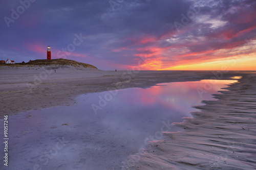 Lighthouse on Texel island in The Netherlands at sunset