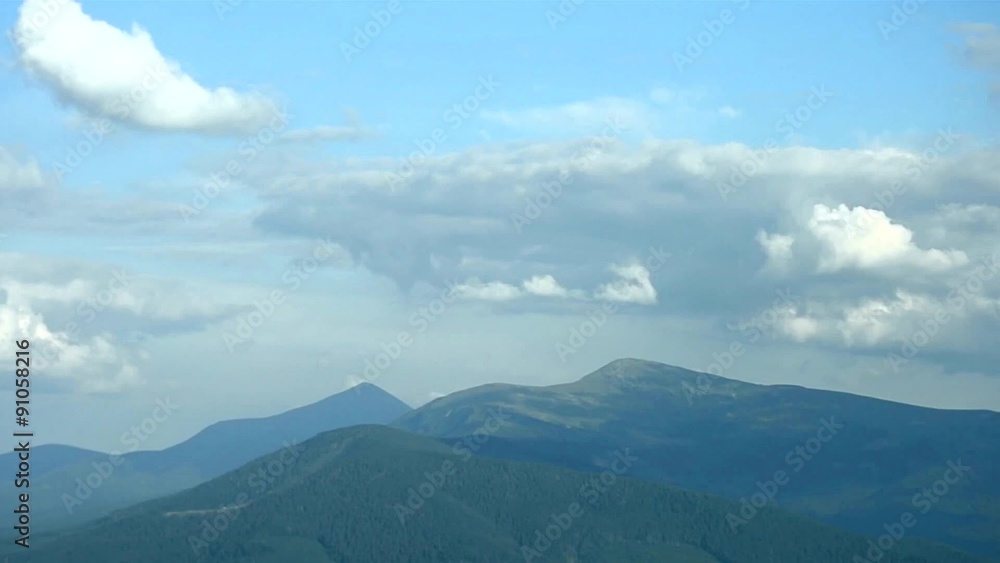 Clouds over Hoverla and Petros mounts in Carpathian Mountains Clouds over Hoverla and Petros mounts in Carpathian Mountains