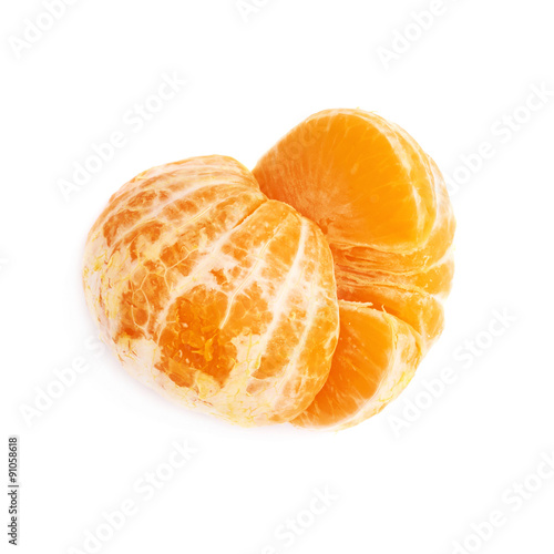 Two halves of fresh juicy tangerine fruit isolated over the
