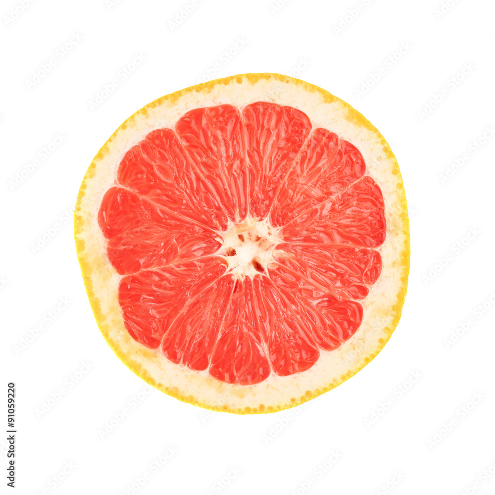 Single ripe grapefruit cut in half isolated over the white Single ripe grapefruit cut in half isolated over the white