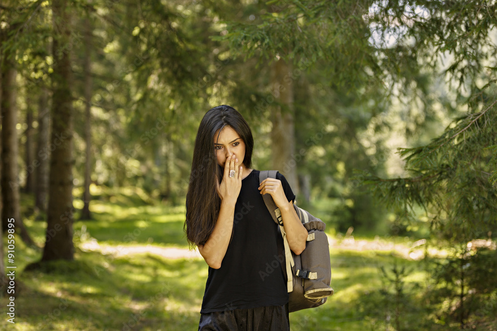 Active healthy beautiful woman hiking in forest Active healthy beautiful woman hiking in forest