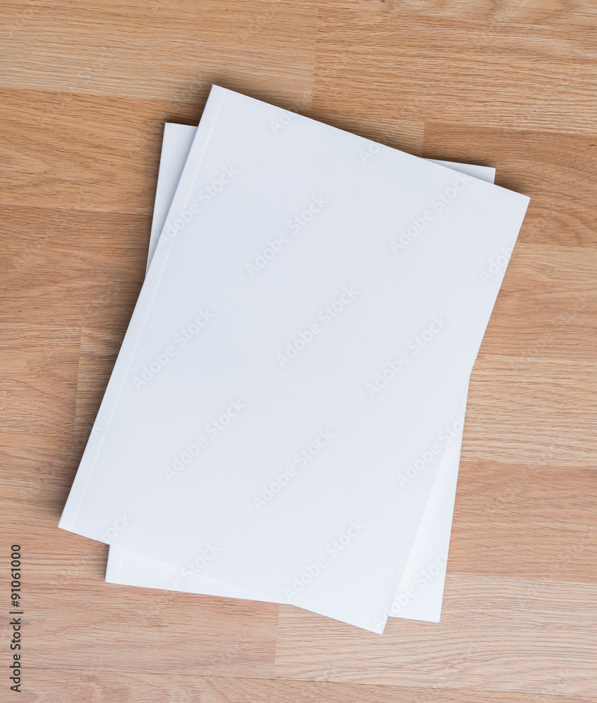 Blank catalog, magazines,book mock up on wood background Blank catalog, magazines,book mock up on wood background