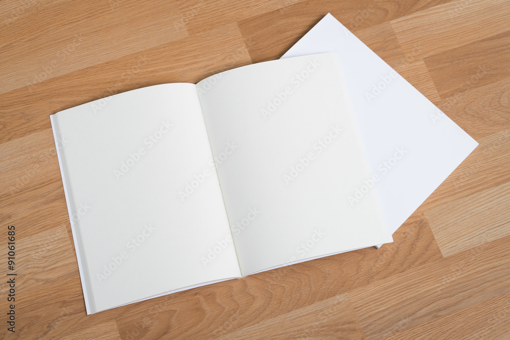 Blank catalog, magazines,book mock up on wood background Blank catalog, magazines,book mock up on wood background