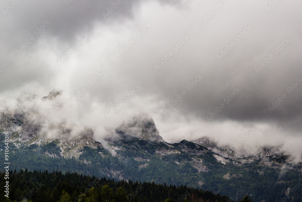 misty landscape in mountains of Dinaric Alps in Durmitor National Park in rainy day misty landscape in mountains of Dinaric Alps in Durmitor National Park in rainy day