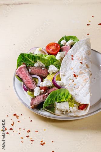 Taco with feta cheese and beef