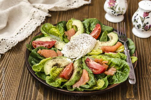 Avocado Salad with Romano tomato salmon and poached egg seasoned dressing green oil 