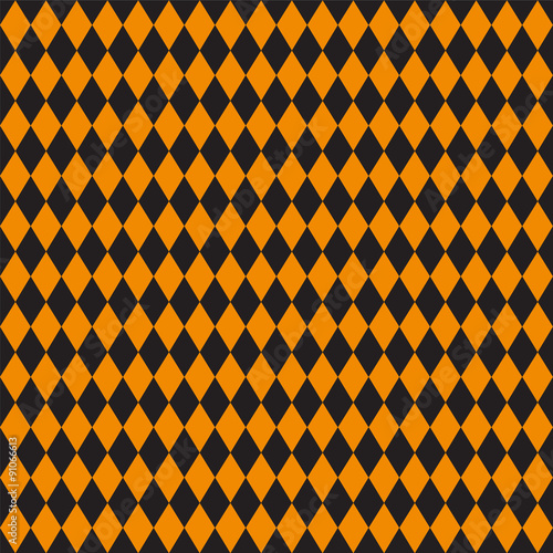 Seamless texture of rhombuses. Black and orange colors.