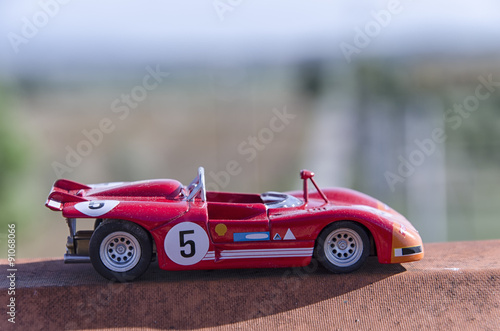 Картината върху платно Model of a old racing car in the sun