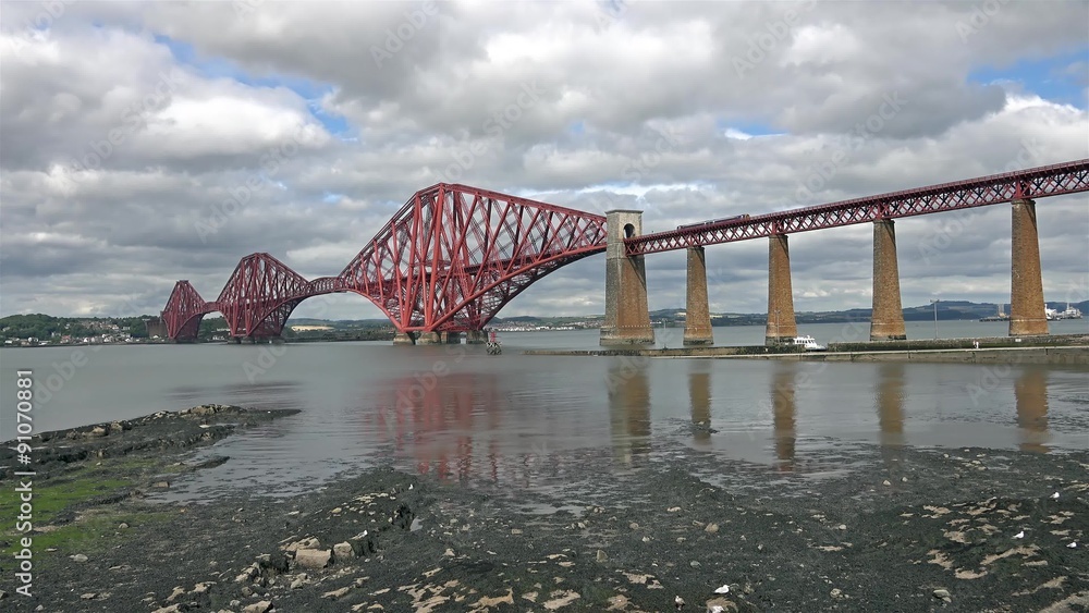 Historic red Forth Bridge in Edinburgh - Scotland - time lapse Historic red Forth Bridge in Edinburgh - Scotland - time lapse