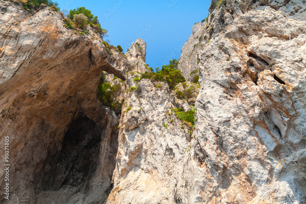 Coastal landscape with rocks and cave. Capri
