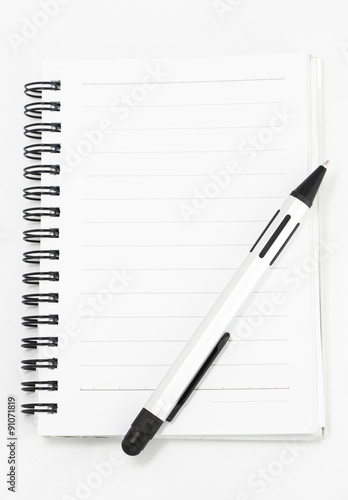 white notebook isolated on white background photo