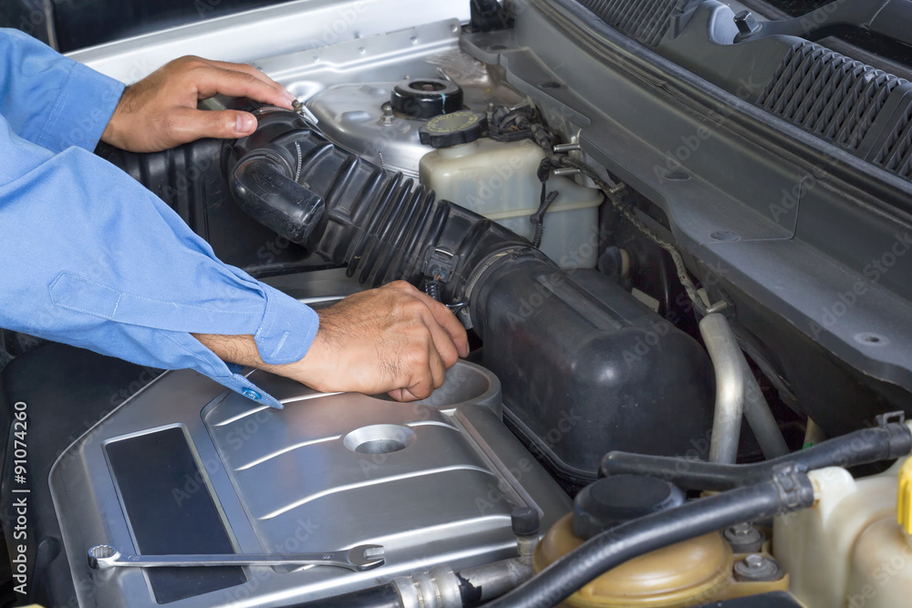 Car repair service, Auto mechanic repairing car engine Car repair service, Auto mechanic repairing car engine