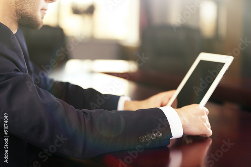 Businessman working with ta...