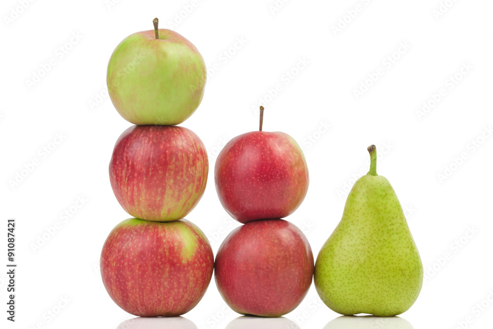 Apples and one pear isolated on white background Apples and one pear isolated on white background
