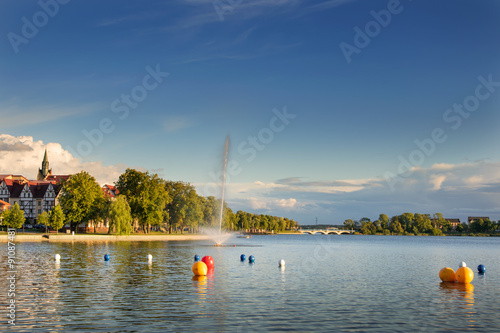 Fototapeta Naklejka Na Ścianę i Meble -  Elk panorama with lake and fountain. Masuria, Poland.
