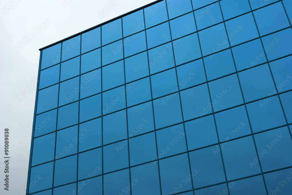 blue square glass building facade blue square glass building facade