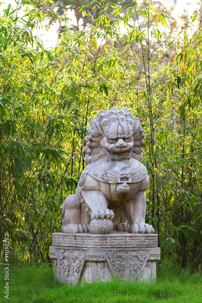 Buddhist sculpture. Chinese guardian lion statue in Gardens by the Bay, Singapore.