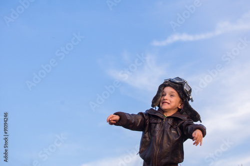 boy with a model airplane field, Young boy-pilot 