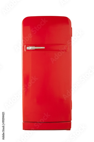 Red vintage refrigerator isolated on white background