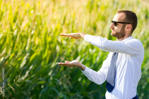 Businessman outdoor with copy space gestures