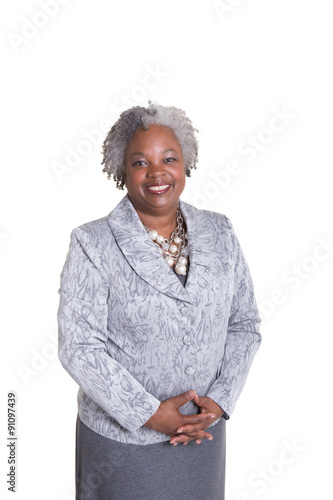Older business woman isolated on white