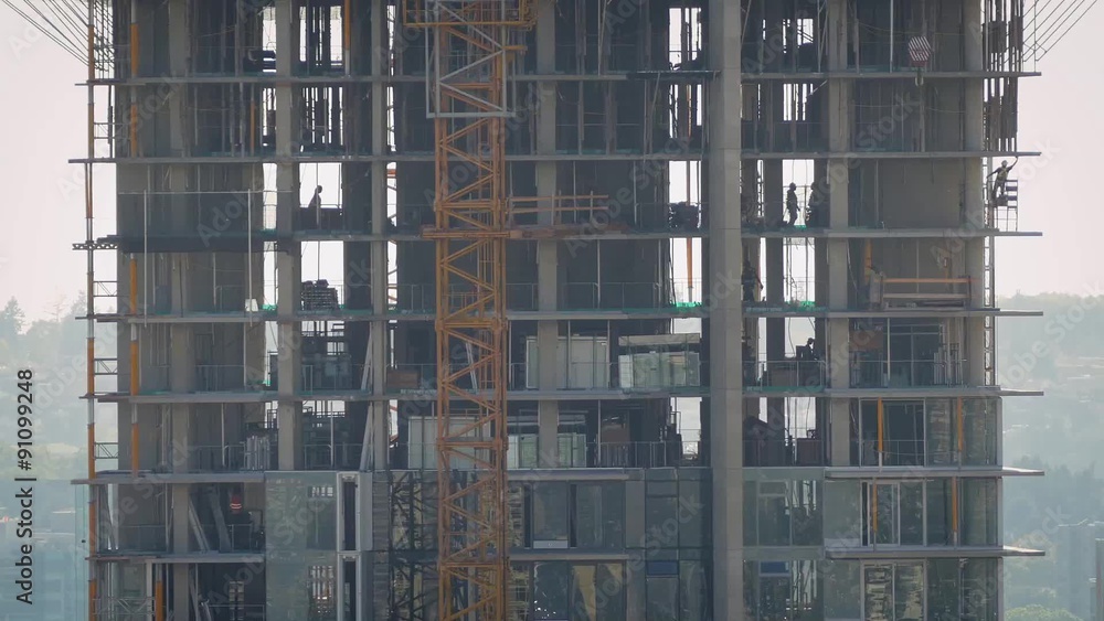 Workers Busy On Levels Of Building Under Construction Workers Busy On Levels Of Building Under Construction