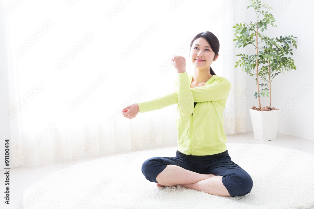 sporty asian woman stretching sporty asian woman stretching