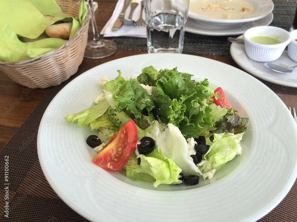 Salad with black olives and tomato Salad with black olives and tomato