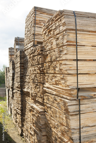 wood, bundles of wooden planks stacked lumber yards