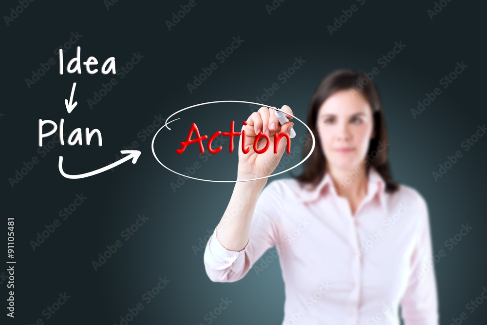 Young business woman writing business concept. Young business woman writing business concept.