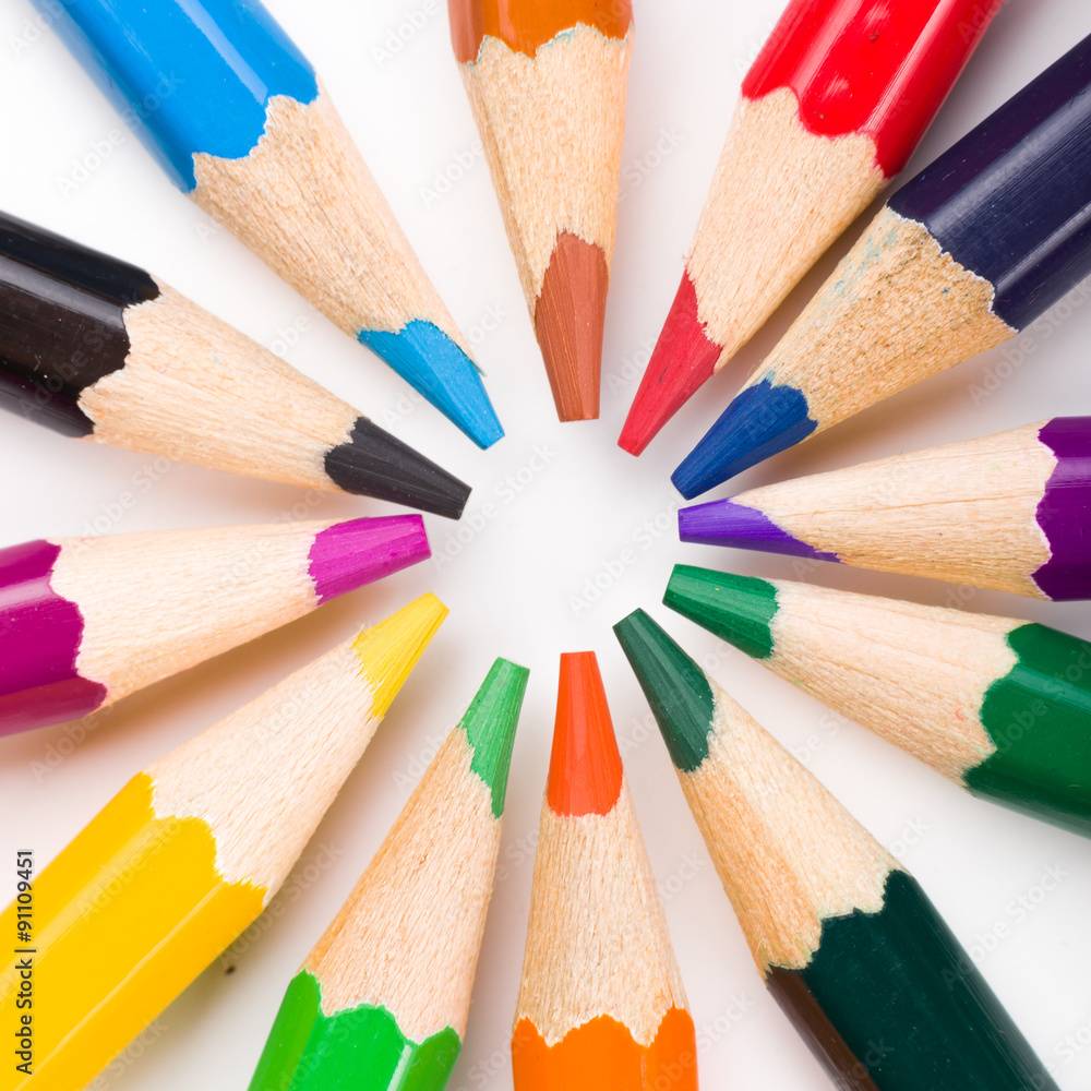 Naklejka premium Many different colored pencils on white background