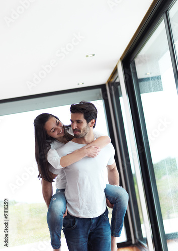 happy young romantic couple have fun and relax at home indoors