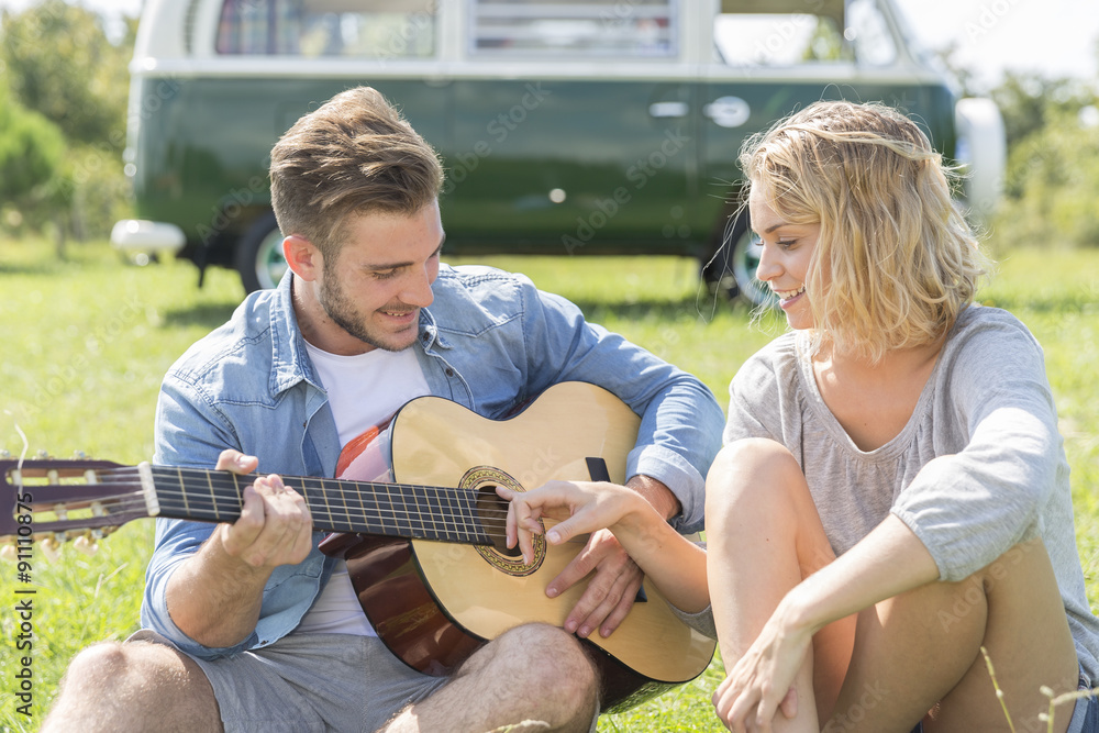 romantic couple of lover playing guitar